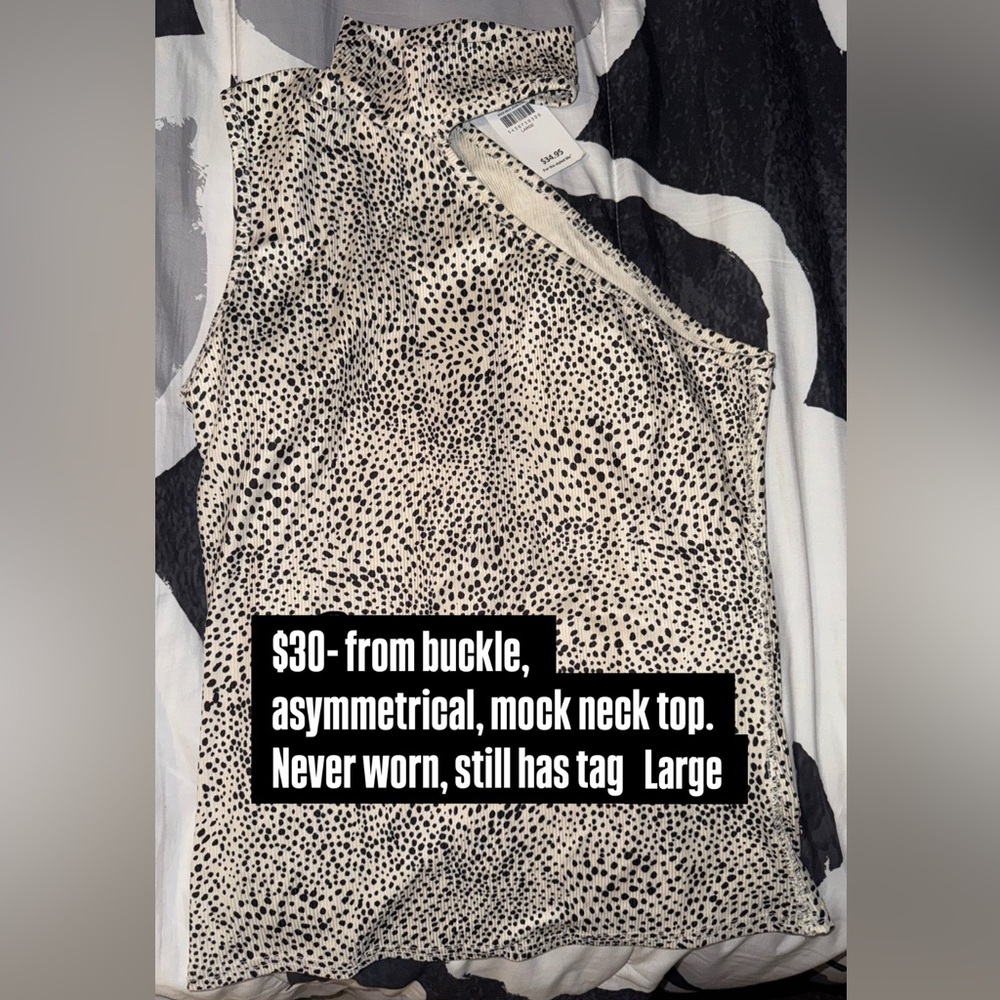 Asymmetrical mock neck top  from buckle never used